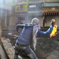 A Palestinian a Molotov cocktail