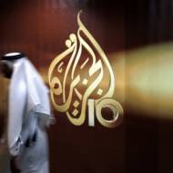 An Al-Jazeera employee in Qatar. (AP Photo/Kamran Jebreili, File)