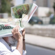 Israeli man tries to beat the heat