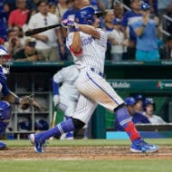 Team Israel's Garrett Stubbs hits a double