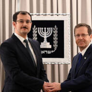 Mukhtar Mammadov (left) presents credentials to Herzog