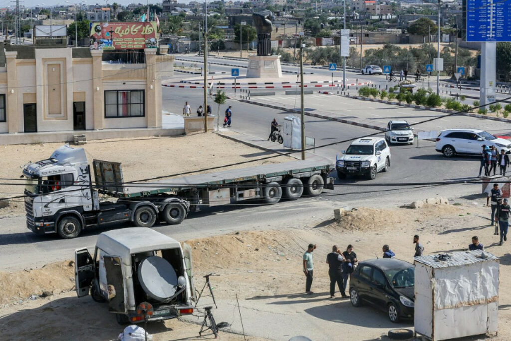 U.N. vehicles and empty trucks wait for the arrival of aid on the Gaza side of the Rafah border crossing with Egypt, Oct. 21, 2023. Photo by Atia Mohammed/Flash90.
