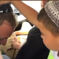 Israeli child blessing IDF soldier