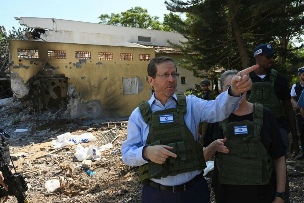 Israeli President Isaac Herzog visits Kibbutz Be'eri in the western Negev on Oct. 15, 2023. Photo by Haim Zach/GPO.