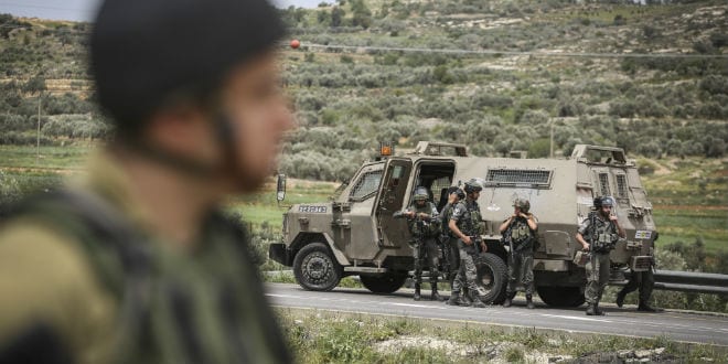 Israeli soldiers at the scene where a Palestinian attacker stabbed two Israeli soldiers earlier today near Maaleh Nevona in the Binyamin area of the West Bank