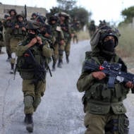 IDF soldiers patrol in Judea and Samaria. (Photo by Issam Rimawi/Flash 90)