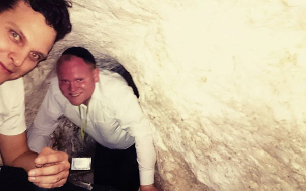 Tourist exploring Bar Kochba cave used for subterranean guerrilla warfare